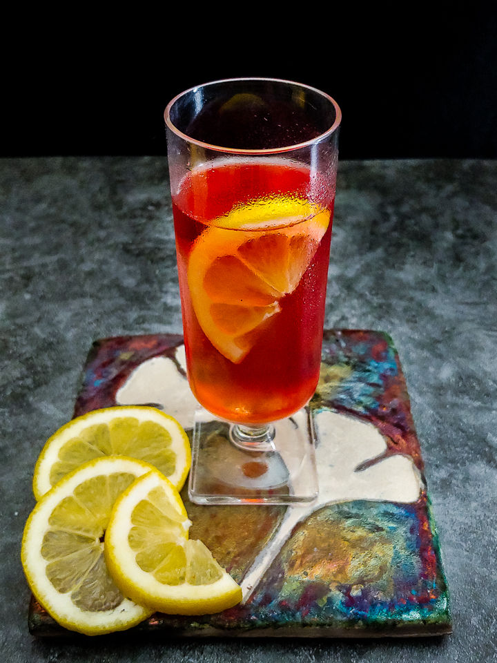 pink cocktail with lemon