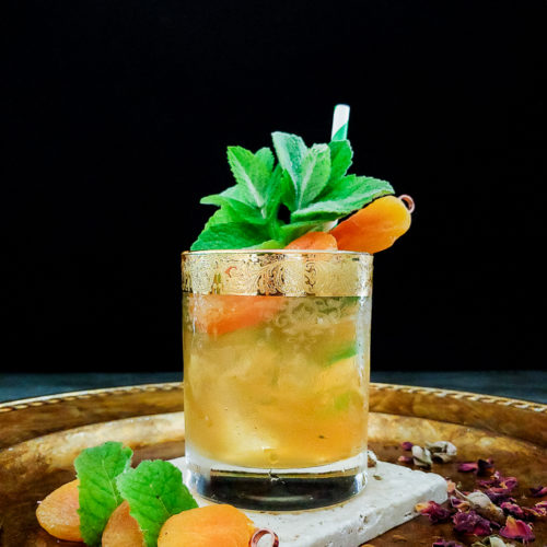julep cocktail with apricot and mint garnish