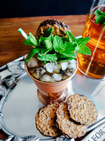 mint julep on silver tray with pecan lace cookies