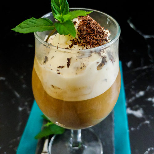 ice cream coffee cocktail in a wine glass with chocolate