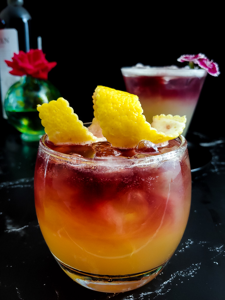 New York Sour - Whiskey sour with red wine float and lemon garnish