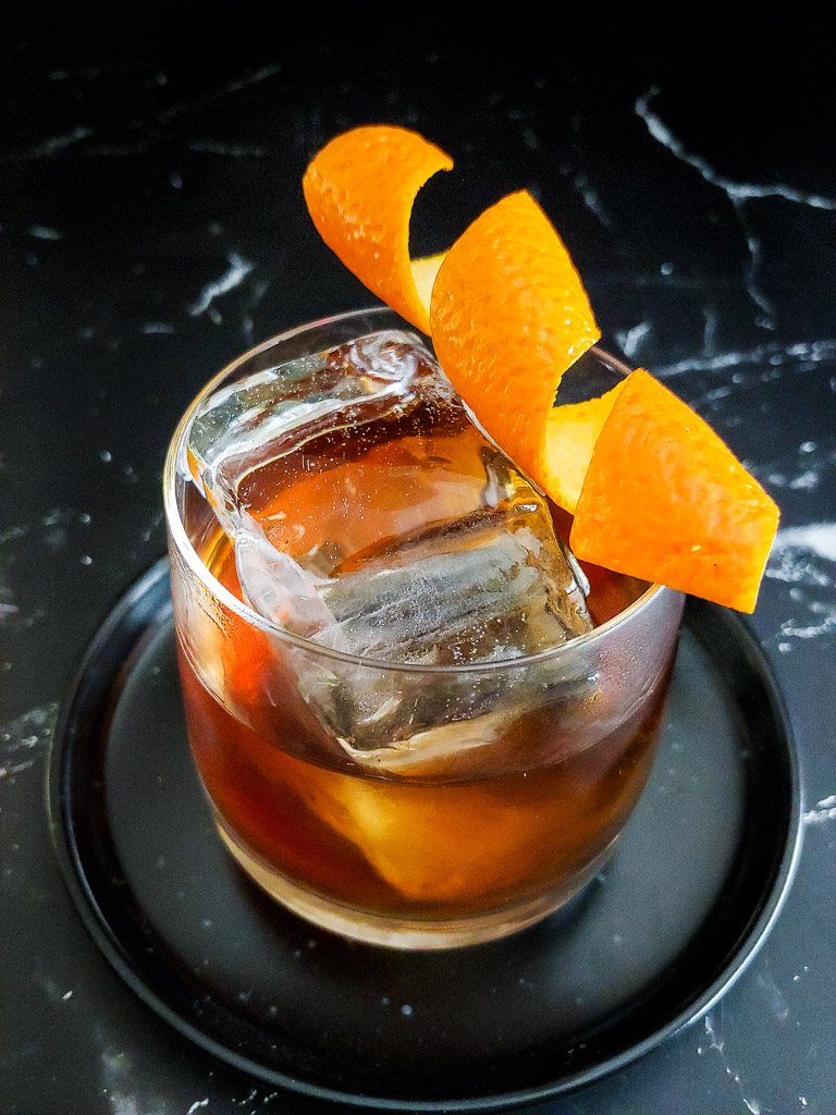 old fashioned cocktail with orange twist