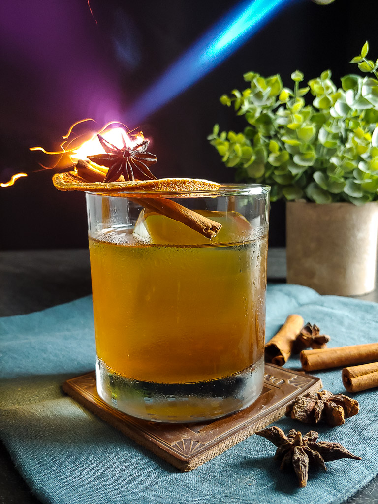Fall Rye Amaro cocktail with orange, cinnamon, star anise garnish
