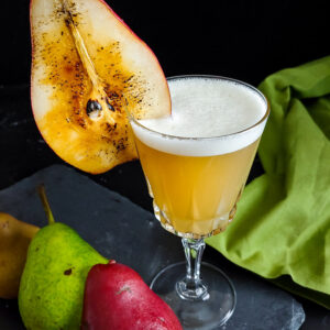Perfect Fall Pear Whiskey Sour - torched pear slice garnish on a whiskey sour