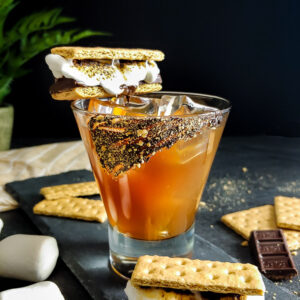 S'mores old fashioned with s'mores garnish and chocolate graham cracker rim