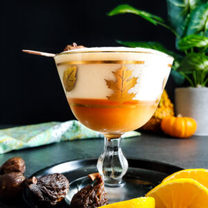 Mandarin Orange Fig Sour - foam-topped sour with fig and orange garnish