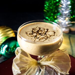 This gingerbread martini cocktail is full of the subtle flavors of a gingerbread cookie, the sweet and bitter, molasses, a hint of ginger, some vanilla notes from the whiskey and a bit of gingerbread bitters added.