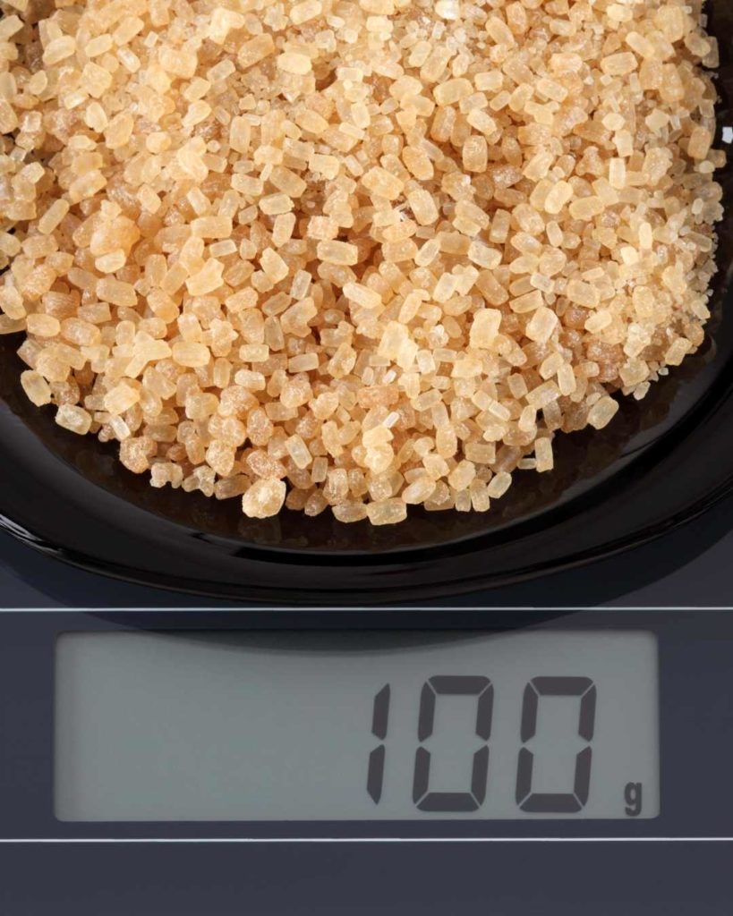 sugar on a kitchen scale